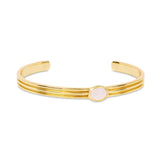 Handmade with sustainably sourced materials, the Athena Gold Cuff Bracelet With Rose Quartz is a sleek and lustrous bangle featuring an oval rose quartz gemstone. The perfect base layer for your daily wrist stack.