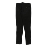 Vintage black Guess Jeans - womens 30" waist
