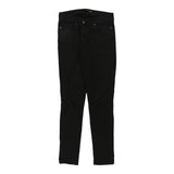 Vintage black Guess Jeans - womens 30" waist