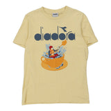 Vintage yellow Diadora T-Shirt - mens x-small
