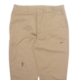 NIKE Mens Trousers Beige Regular Tapered W38 L25