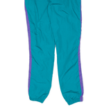 ELLESSE Womens Track Pants Blue Nylon Tapered UK 10 W26 L30