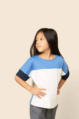 Girls tops. Made from organic Peruvian cotton. Bright blue, white, and navy block colors. Cut and sewn in LA.