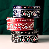 Body butter jars on green background