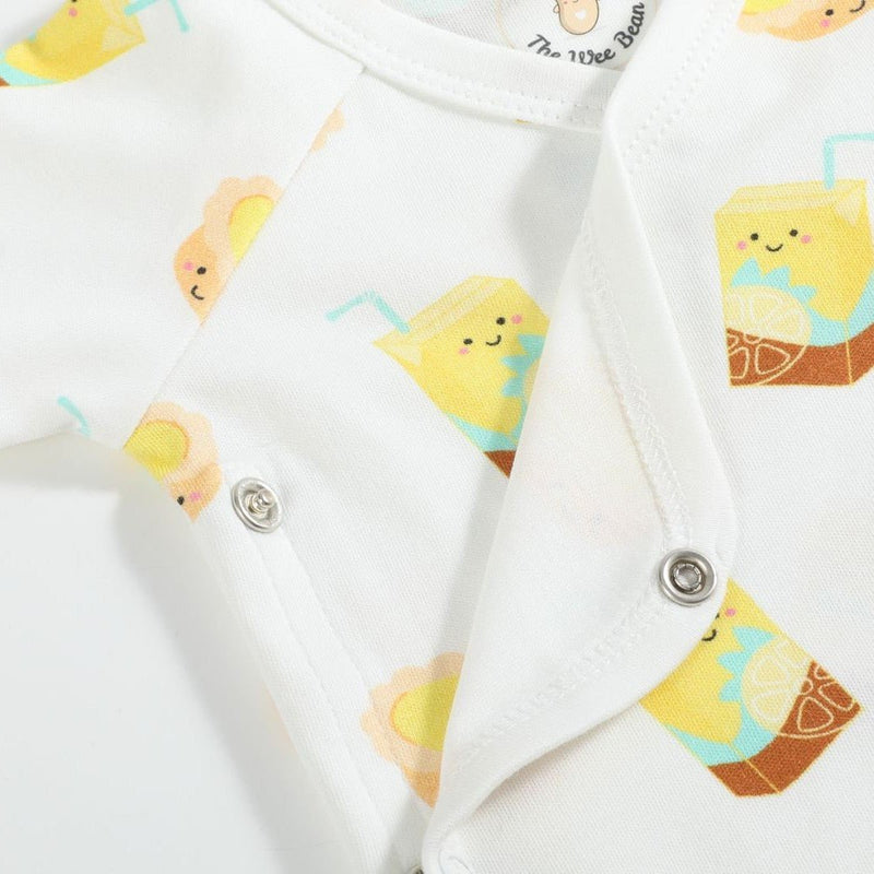 the wee bean organic cotton onesie lemon tea egg tart side snap buttons