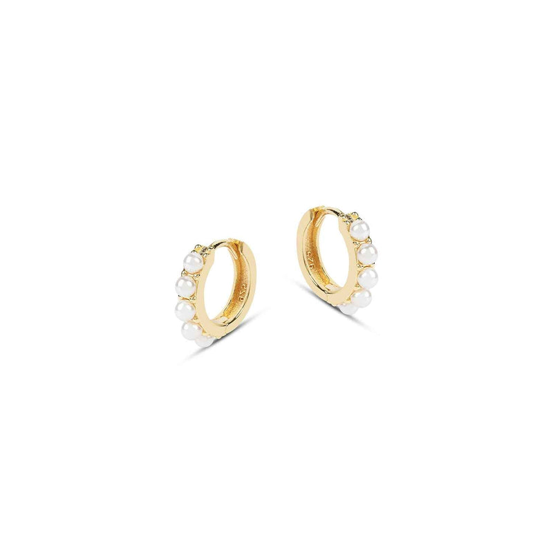 You can't go wrong with a pair of Laura Mini Hoop Earrings. Handmade from recycled materials and featuring mini vintage pearls, these are the perfect huggies to add to your everyday collection.