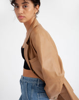 Sustainable leather blazer with relaxed fit in black #color_camel