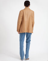 Sustainable leather blazer with relaxed fit in black #color_camel