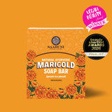 Saabuni Marigold Soap Bar packaging on an orange background with awards displayed.
