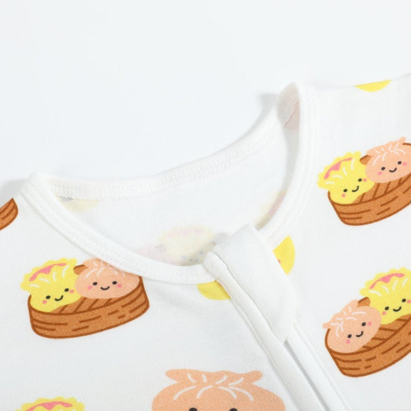 the wee bean organic cotton and bamboo blend reversible zipper footed footie romper in dim sum with crew neck