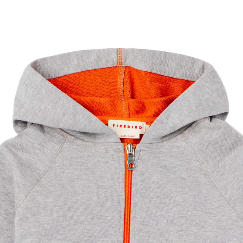 This must have summer hoodie for kids features a contrast orange zipper, lining and a hood. Unisex. Light weight and durable, it is made from organic Italian cotton in NYC.