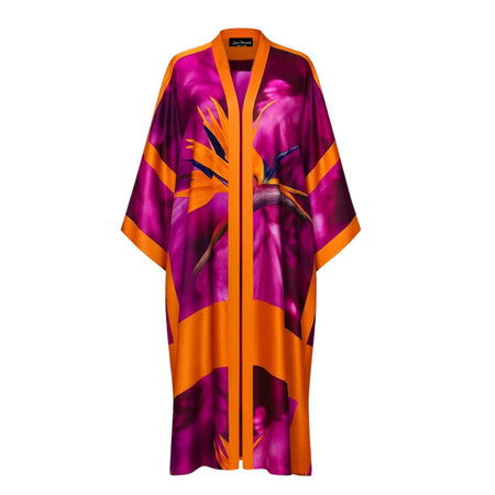 A full-length image of a pink and purple printed silk kimono with a floral pattern, displayed on a mannequin.