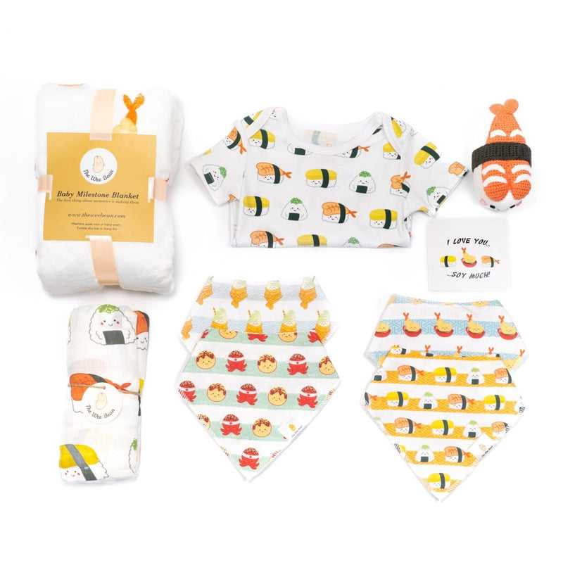 the wee bean organic and sustainable big baby gift set with blankets bibs swaddle and rattle doll in taste of japan sushi tempura