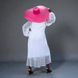 Women's Plus Size Aphrodite White Holiday Resort Dress with hoodie and white undergarment, paired with a pink sunhat and black heels.