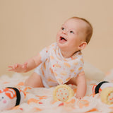 cute baby wearing the wee bean's bakery buns bib and onesie