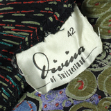 DIVINA Womens Pleated Skirt Black Midi Viscose Crazy Pattern M