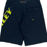 Bold Logo Oakley Graphic Sport Shorts - 32″ Waist Yellow Polyester
