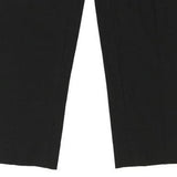 Cheap & Chic Moschino Trousers - 32W UK 12 Black Cotton