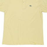 Vintage yellow Lacoste Polo Shirt - mens large