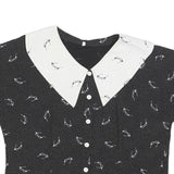 Womens Black & White Printed Top Short Sleeve Button Neck L Glasses Print