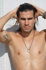 Male model wearing MHART black pearl coin necklace