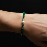 Man's wrist wearing Green Tigers Eye Pearl Bracelet - no chain extender