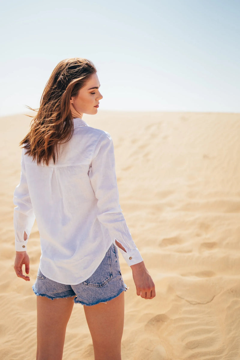 Casual women's linen shirt in white.