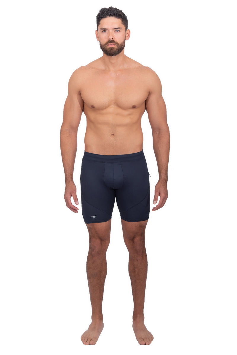 male model wearing solid navy compression shorts