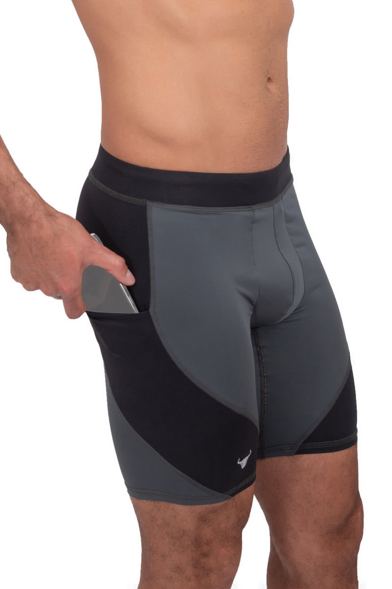 side view of gray and black compression shorts for men with phone pocket