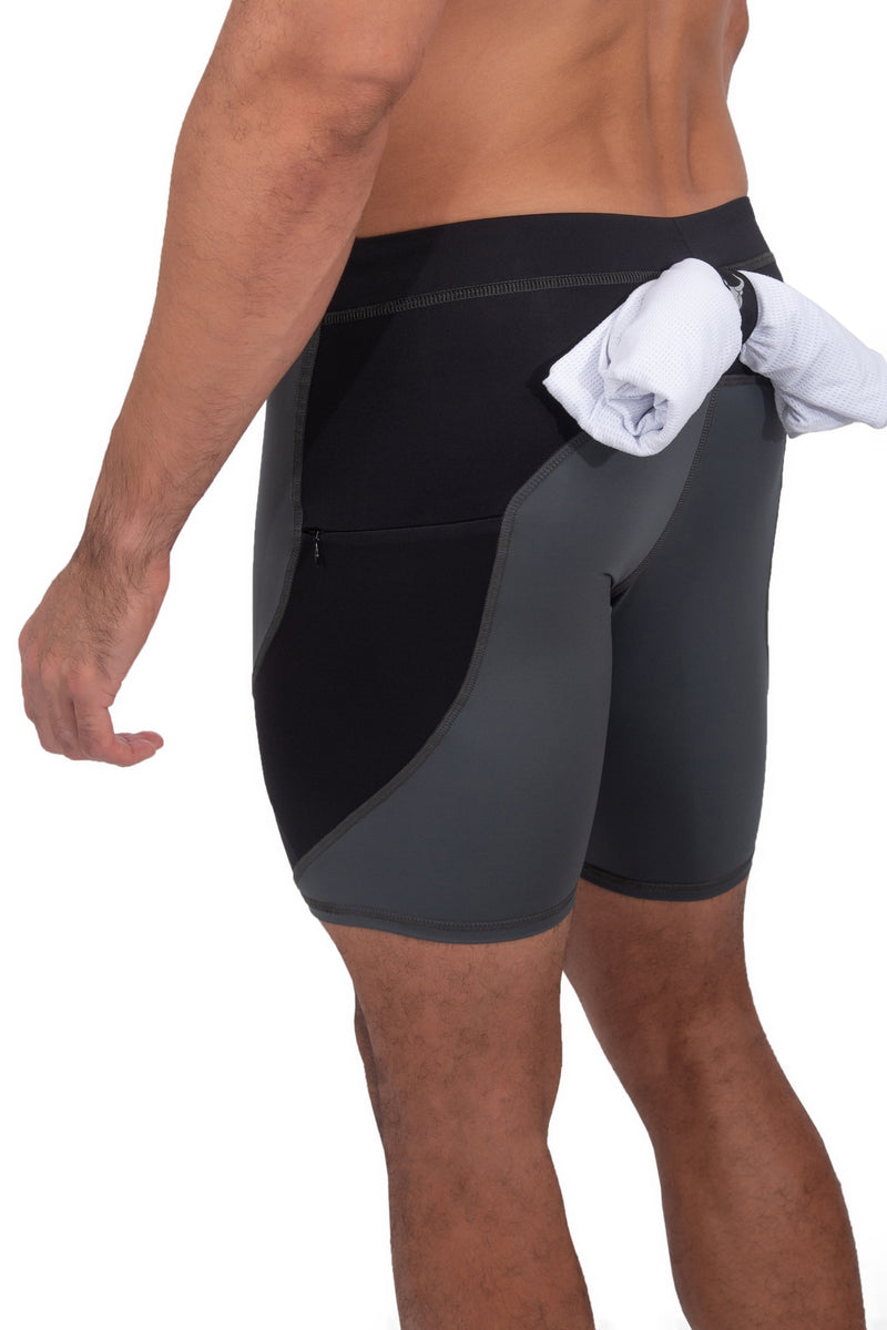 back side of gray and black men's short leggings with towel loop