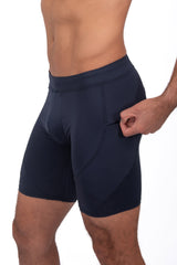 side view of solid color navy short leggings with secure zip pocket