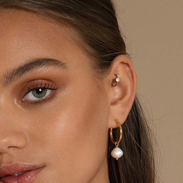 The perfect everyday gold hoop earrings entirely handmade with sustainable materials