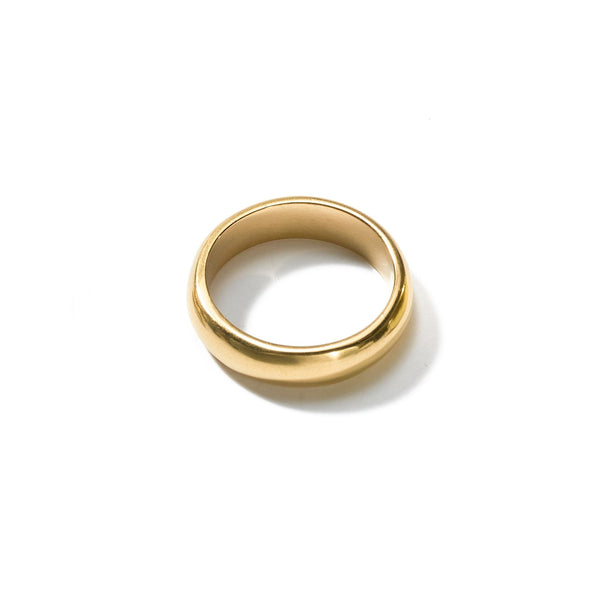 A simple yet elegant size 7 ring handcrafted from upcycled brass, featuring a narrow width, and made to be worn every day.