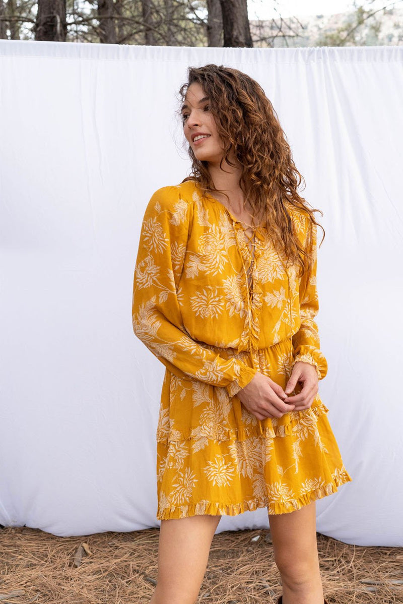 Florance mini dress in Golden Toile print for women by Paneros Clothing. Elastic waist with a flowy fit, and lace-up front from deadstock rayon fabric.  Front View zoom in.