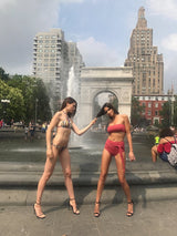 Front of Giovanna high waisted swimsuit in Terracota. Washington Square Park, NYC.