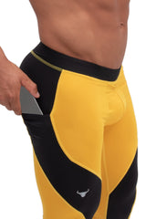 side view of two color yellow and black male leggings with phone pocket