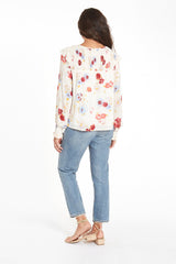 Mabel Blouse in Prairie Bloom print for women by Paneros Clothing. Made from 100% deadstock rayon fabric. Side view.