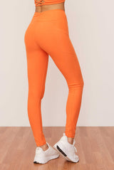 Tangerine Ruched Crossover Pocket Legging
