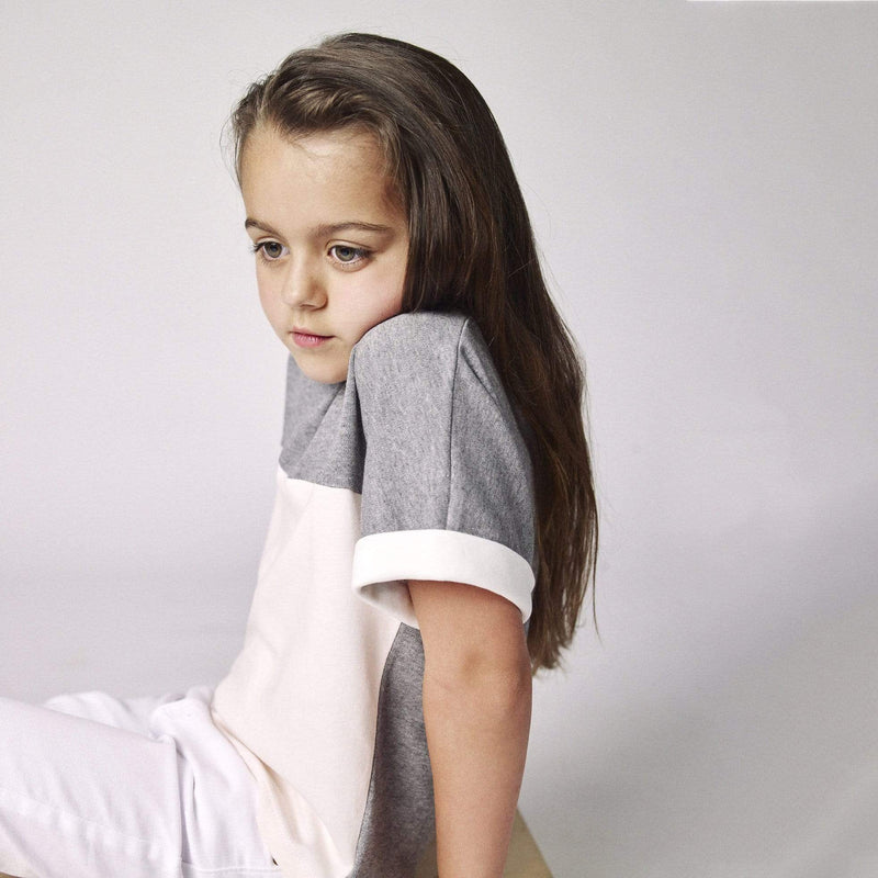 Girls tops. Made from organic Peruvian cotton. Heather grey, blush pink and white block colors. Cut and sewn in NYC. 